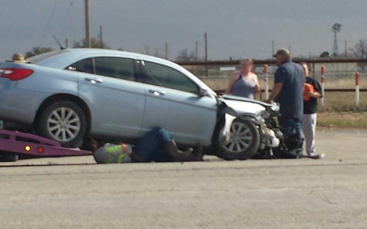 A blue Chrysler 300 crashed into a Ford F-250 on FM 2105 on March 18, 2015. (LIVE! Photo/Amanda Henson)