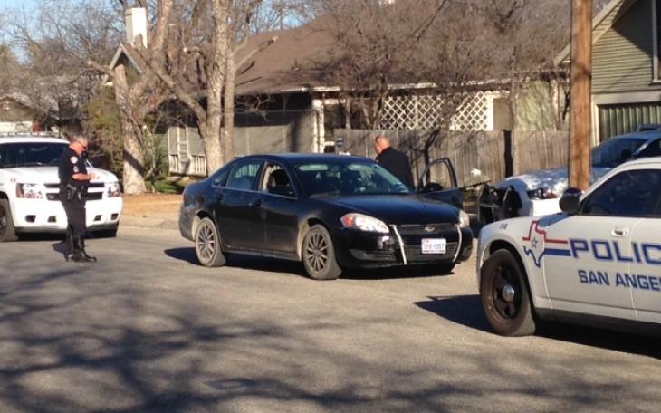 A black Chevrolet abandoned by the suspect who fled on foot. (LIVE! photo/John Basquez)