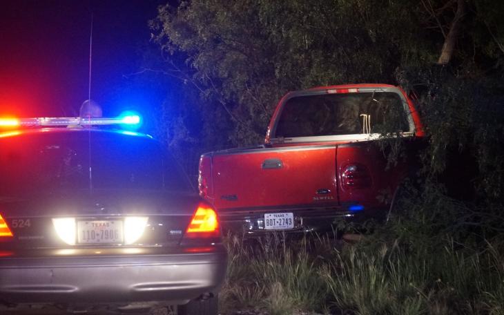 The red Ford pickup that was in the rollover crash. (LIVE! Photo/John Basquez)