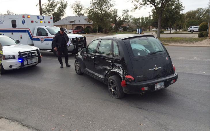 Chrysler PT Cruiser vs. semi truck on S. Koenigheim St. (LIVE! Photo/John Basquez)