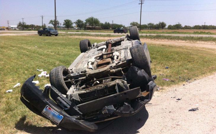 Ford Mustang in rollover crash on US 277 South near the Yellowhouse dealership on June 30, 2014. (LIVE! Photo/Matt McDaniel)