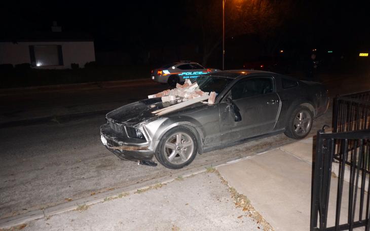 A driver of a Ford Mustang fled the scene after crashing into a home early Saturday morning, Apr. 4, 2015. (LIVE! Photo/John Basquez)