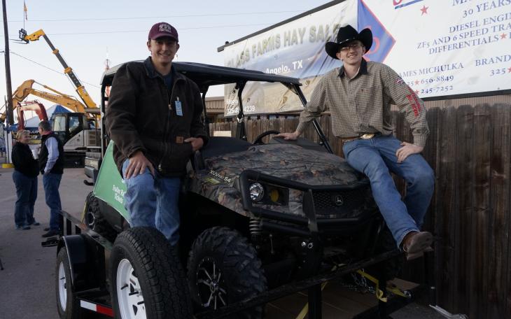 Ross Baxter (L) and Charles Robinson (R) show off the Wall HS FFA raffle prize. (LIVE! Photo/Joe Hyde)