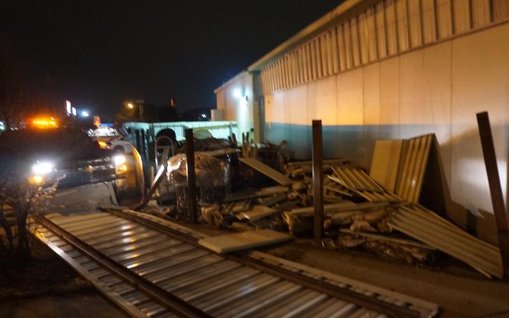 A man driving a late model Chevy Silverado crashed into the fenced area behind Lowe's after abandoning his place in line at the Whataburger Drive-Thru. (LIVE! Photo/John Basquez)