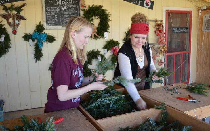 Jodie and Kenzie Uptergrove working in the wreath shop (LIVE! Photo by Lauren Lopez)