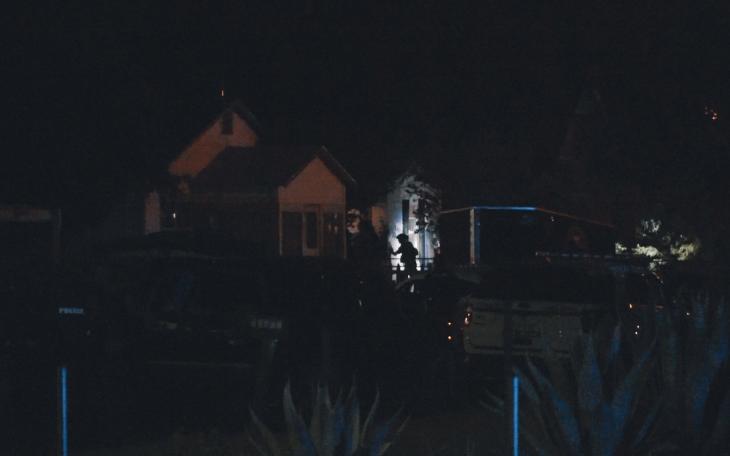 The standoff on E. 20th St. in May 2020. SWAT enters the building.