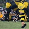 The Menard Yellow Jackets run onto the field before a game against Rocksprings during the 2025 season.