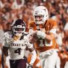 Texas Longhorns Arch Manning in action against Texas A&M