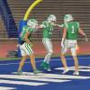 The Wall Hawks celebrate after a touchdown against Idalou in the regional final at San Angelo Stadium on Friday, Dec. 5, 2025.