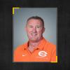 The athletic director and head football coach at Celina Independent School District announced his retirement Wednesday as district officials cleared him and other employees of wrongdoing in a sexual abuse case involving his son.