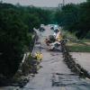 First responders on a bridge covered by water after the flood in Kerrville on July 16, 2026.