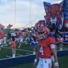 The Central Bobcats run out of the tunnel before their 2026 season opener against Abilene High.