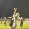 Branson Lacy bats down a 4th down pass intended for Rankin's Brinden Norwood