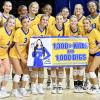 2026 Volleyball Team celebrating Madi Parrish 1,000 digs